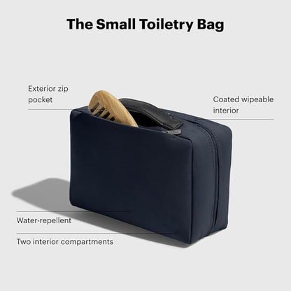 Away Small Toiletry Bag, Travel Essentials Organizer with Mesh and Clear Pockets, Waterproof, Easy to Clean, Compact Travel Pouch, Jet Black