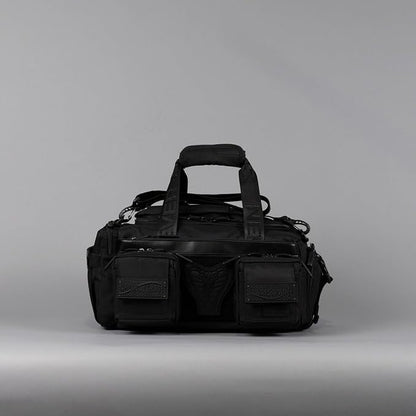 WOLFpak 20L Mini Duffle Bag for Gym & Travel | Waterproof Carry-On Weekender Bag with Shoe Compartment, Hard Bottom, and Tactical Molle System (Black Venom)