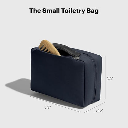 Away Small Toiletry Bag, Travel Essentials Organizer with Mesh and Clear Pockets, Waterproof, Easy to Clean, Compact Travel Pouch, Jet Black