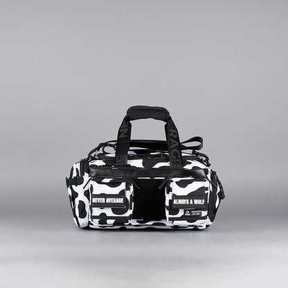 WOLFpak 20L Mini Duffle Bag for Gym & Travel | Waterproof Carry-On Weekender Bag with Shoe Compartment, Hard Bottom, and Tactical Molle System (Black & White Cow)