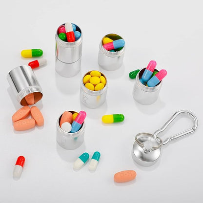 Vesici 2 Pack Metal Weekly Pill Organizer Travel Pill Container with Keychain 7 Day Weekly Waterproof Small Capsules Holder Case Box Stackable for Women Men Travel Outdoor(Black, Silver)