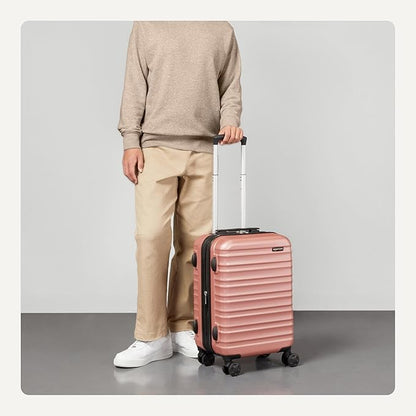 Amazon Basics 21" Hardside Carry-On Luggage, Hardshell Suitcase With Wheels, Expandable For Up to 25% More Space, With Scratch-Resistant Surface, Four Multi-directional Wheels, Rose Gold