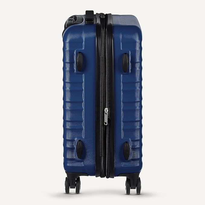 Amazon Basics 21" Hardside Carry-On Luggage, Hardshell Suitcase With Wheels, Expandable For Up to 25% More Space, With Scratch-Resistant Surface, Four Multi-directional Wheels, Navy Blue