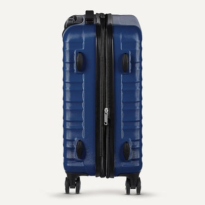 Amazon Basics 21" Hardside Carry-On Luggage, Hardshell Suitcase With Wheels, Expandable For Up to 25% More Space, With Scratch-Resistant Surface, Four Multi-directional Wheels, Navy Blue