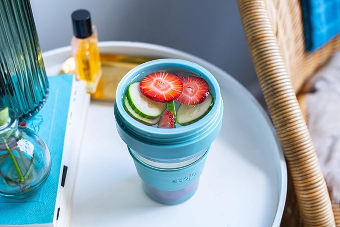 STOJO Collapsible Travel Cup - Reusable To-Go Pocket Size Silicone Bottle for Hot and Cold Drinks - Perfect for Camping - Microwave & Dishwasher Safe (16 Ounce (Pack of 1), Translucent Eucalyptus)