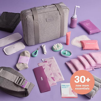 Frida Mom 30pc Pre-Packed Hosptial & Baby Essentials Travel Bag, Includes C-Section Delivery & Recovery Must Haves, & Newborn Grooming Kit, Easy to Organize, Removable Toiletry Bags & Suitcase Strap