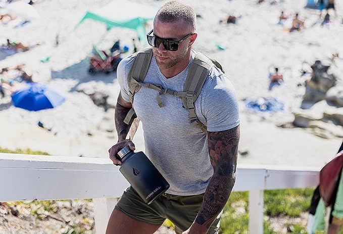 HYDRO CELL Stainless Steel Insulated Water Bottle with Straw - For Cold & Hot Drinks - Metal Vacuum Flask with Screw Cap and Modern Leakproof Sport Thermos for Adults (Graphite/Black 64oz)