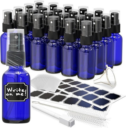 Nevlers 1 Oz Cobalt Blue Glass Spray Bottles Mist Sprayer 24 Pack | Small Spray Bottle Set w/ Shrink Wrap, Funnel, Brush, Marker, & Labels | Misting Bottle Sprayer for Home | Travel Spritzer Bottles